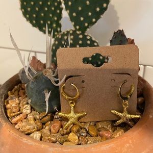 Gold starfish hoop earrings